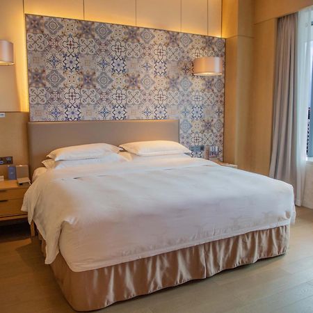 Hotel WYNDHAM GRAND Plaza Royale Yuzhou Xiamen Esterno foto