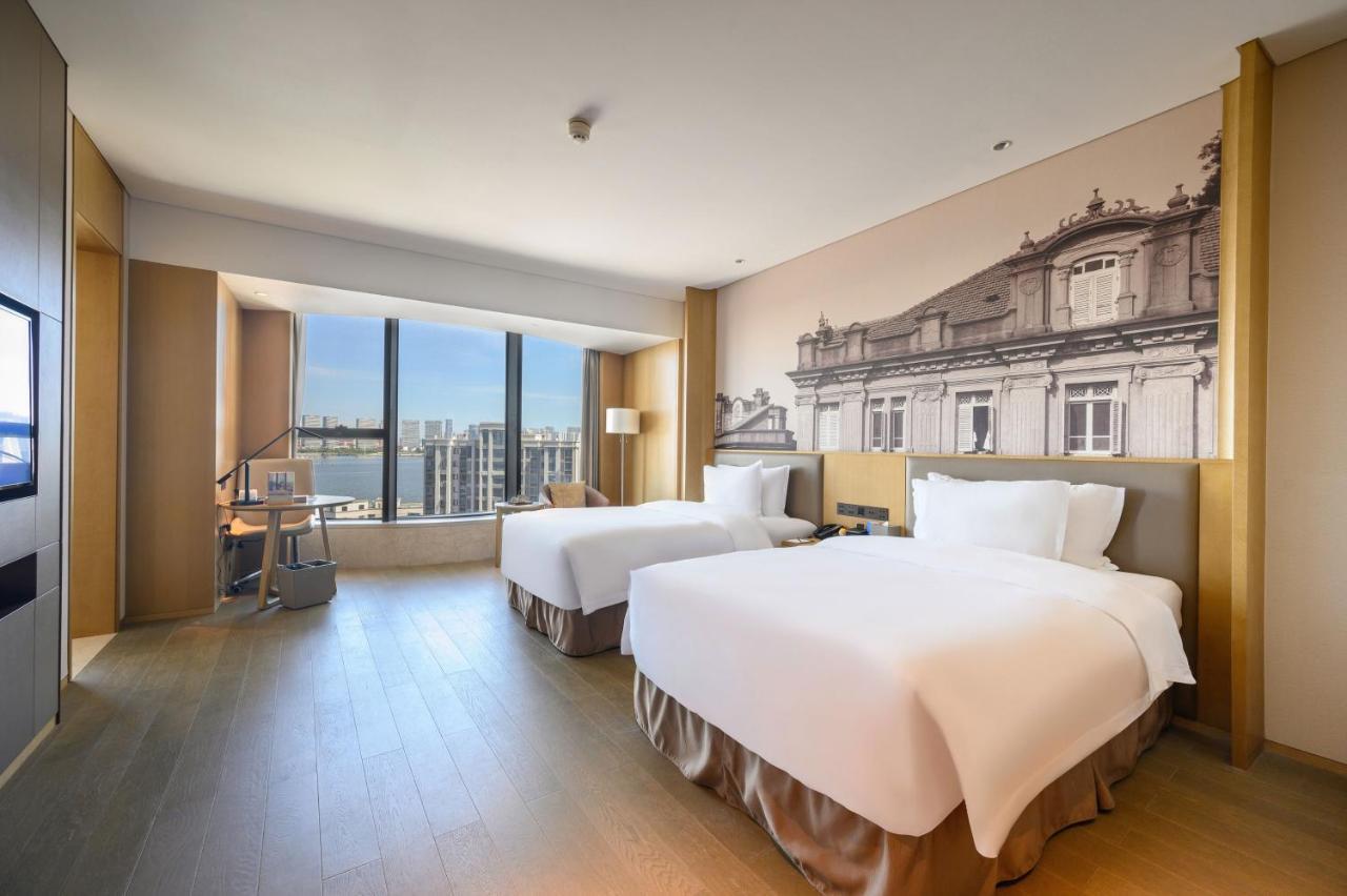 Hotel WYNDHAM GRAND Plaza Royale Yuzhou Xiamen Esterno foto