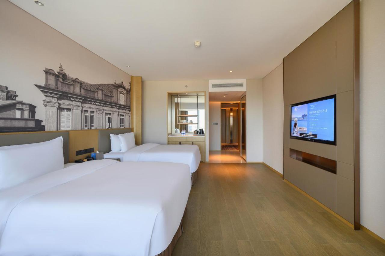 Hotel WYNDHAM GRAND Plaza Royale Yuzhou Xiamen Esterno foto
